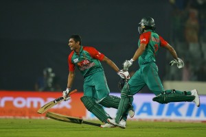 Bangladeshs captain Mashrafe Mortaza, right, and Mahmudullah celebrate after winning the Asia Cup Twenty20 international cricket match against Pakistan in Dhaka, Bangladesh, Wednesday, March 2, 2016. Bangladesh won by five wickets. (AP Photo/A.M. Ahad)